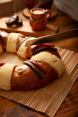 Rosca de Reyes, also called Three Kings Bread, Roscon, Epiphany Cake, traditionally served with hot chocolate in a clay Jarrito. Mexican tradition on January 5th.