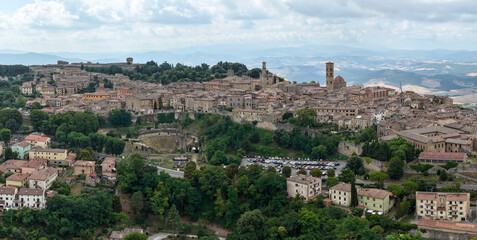 Fototapeta premium Roman Theatre and Historic Hilltown Panorama - Volterra, Italy