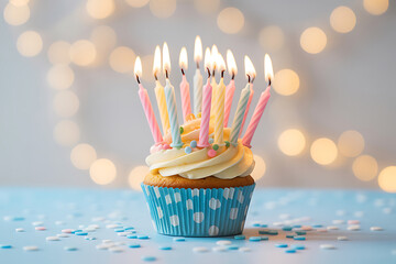 Celebrate a special birthday with this delicious cupcake topped with colorful candles and creamy frosting for a sweet moment