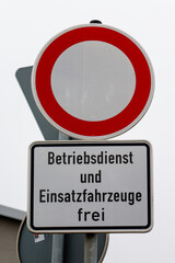 German no entry road sign with exception for service and emergency vehicles