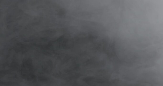 A cinematic fog environment stock video featuring slow-moving mist and drifting smoke that creates a mysterious and atmospheric mood. Perfect for horror, thriller, fantasy, suspense