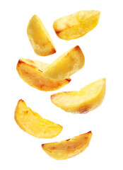 Baked potato wedges falling on white background