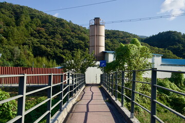 Walkway by Factory Silo