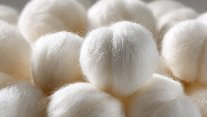 Soft white cotton balls showcasing fluffy texture and round shape