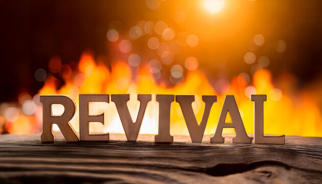 word revival in wood letters backlit by fire with a beautiful bokeh background