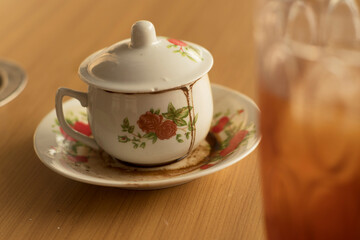 Vintage Cup Design with Liquid Stain of coffee