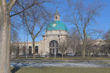 Naklejka premium CNE Ontario Government Building, designed by Chapman and Oxley, 1926, viewed from Martin Goodman Trail, December, Toronto