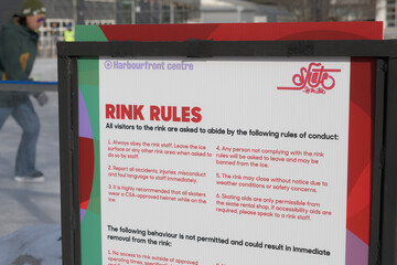 Fototapeta premium Harbourfront Centre ice skating rink board with rules at Ann Tindal Park, Toronto
