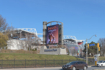 Fototapeta premium wide view of digital roadside billboard at Ontario Dr entrance to Exhibition Place, Toronto (film promotion for David)