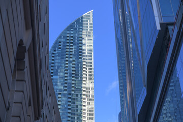 Fototapeta premium view of L-Tower, a 58 storey residential skyscraper designed by Daniel Libeskind, located at 8 The Esplanade, Toronto