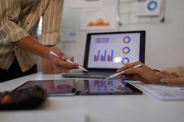 Business team have a discussion on financial report, business analyzing marketing data at office. Bookkeeping, document for financial planning, accounting and business budget management, close up

