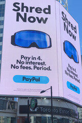 Naklejka premium digital billboard facing Sankofa Square featuring PayPal advertising, Toronto