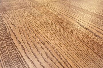 Wooden desk surface closeup