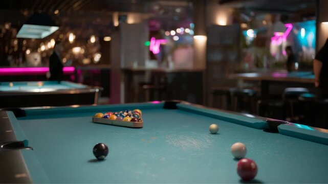 Billiard balls on a pool table in bar setting for entertainment game
