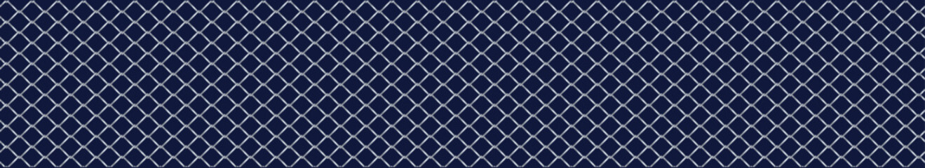 Silver wire mesh fence on a blue background.
