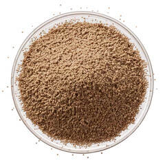 Small brown pellets in a glass bowl