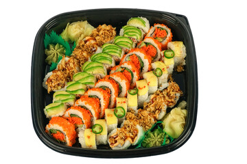 close up on party size fresh sushi roll in container