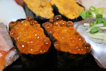 Ikura (salmon roe) nigirizushi purchased at a supermarket in Tokyo, Japan