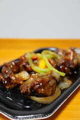 Black vinegar subuta (sweet and sour pork) purchased at a supermarket in Tokyo, Japan