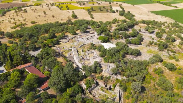 Tevfikiye, Turkey. Imposing defensive walls, towers and the Scaean Gate of the ancient city of Troy, Canakkale. Aerial view, Departure of the camera, MasterShots