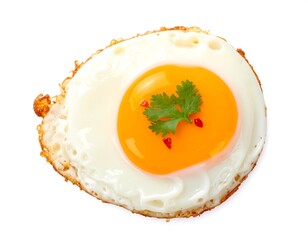 Fried egg on white with cilantro and chili flakes, sunny-side up, golden yolk