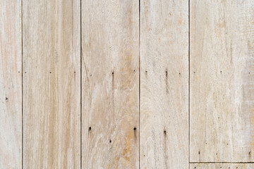 empty brown vertical striped wooden table by top view or old white wood wall or floor for home interior or exterior pattern and texture background or nail wallpaper on vintage retro board timber