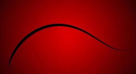 Silhouette of a curved bridge against a red sunset sky