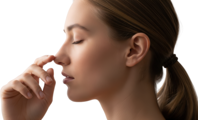 Close up profile of a young woman's face with eyes closed touching her nose isolate Closeup Female Beauty