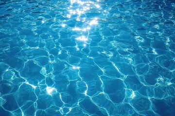 Obraz premium Sunlit turquoise pool water with gentle ripples and sparkling reflections, a shimmering calming scene that feels refreshing and peaceful