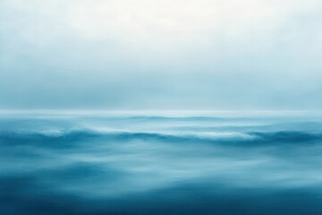 misty horizon over a tranquil blue ocean with gentle rolling waves and a soft overcast sky, peaceful and meditative