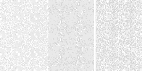 Abstract textured background with delicate floral patterns in grayscale © Ramanath