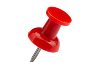 Shiny red pushpin with silver metal point isolated