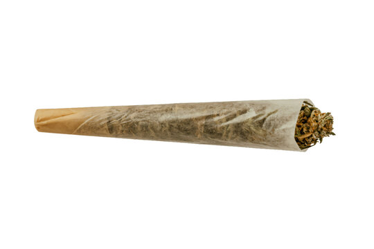  A single, hand-rolled cigarette containing herbal material is shown lying horizontally. 