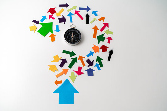 Lack of Direction and Leadership Concept with Multicolored Arrows and Compass