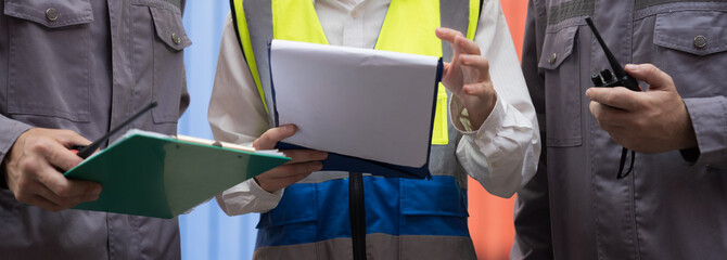 Hands, holding, Hands of worker working, meeting, discussing. Worker wearing uniform at work. Checking, inspecting quality control