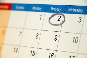 Closeup of circle mark on calender date, business or meeting concept.