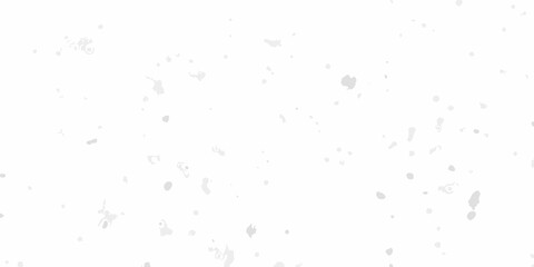 A white grainy texture with scattered dark speckles across a neutral background
