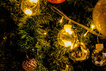 Christmas decoration with christmas tree, ball, gift. Decorated Christmas tree.