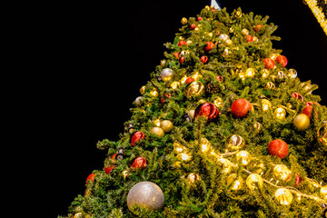 Christmas decoration with christmas tree, ball, gift. Decorated Christmas tree.