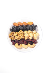 Assorted Nuts and Dried Fruits Daily Snack Mix on White Plate