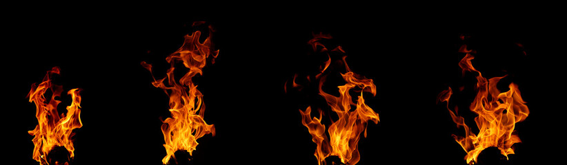 Collection of burning torch flames isolated on black background. Different burning effects. Flames in the night sky. 