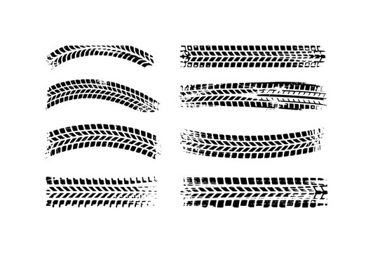 Collection of Black Tire Tracks and Tread Marks on White Background