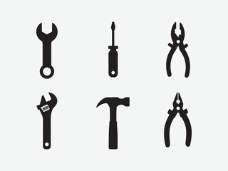 Set of black silhouette icons of hand tools, Collection of silhouetted hand tools including wrenches screwdrivers pliers hammers and saws vector illustration