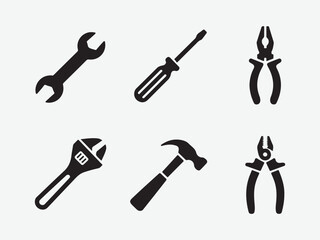Set of black silhouette icons of hand tools, Collection of silhouetted hand tools including wrenches screwdrivers pliers hammers and saws vector illustration