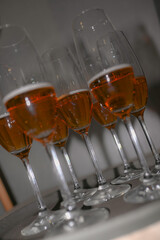 glasses filled with wine for wedding toasts