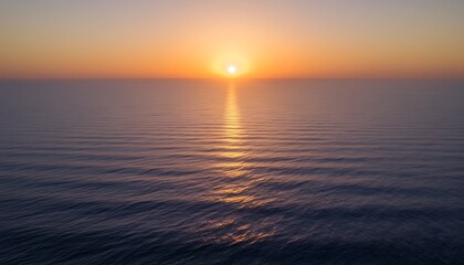 Obraz premium Ocean sunset horizon with calm waves and warm golden light for travel branding, wellness backgrounds, minimalist design, and serene coastal themes