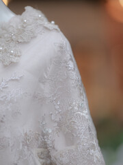 detail wedding dress in the garden