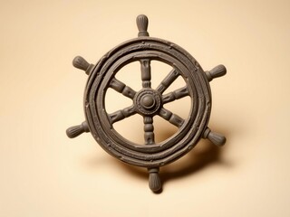 Obraz premium Vintage Ship Wheel Nautical Decor Isolated on Beige Background