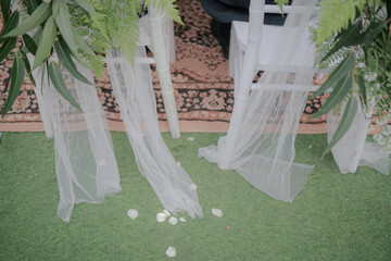 wedding ceremony chairs at a wedding in a park