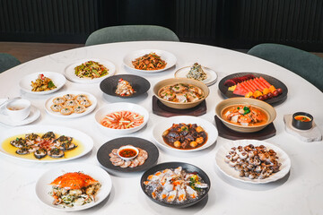 The seafood Chinese dishes laid out on the table were diverse and varied.